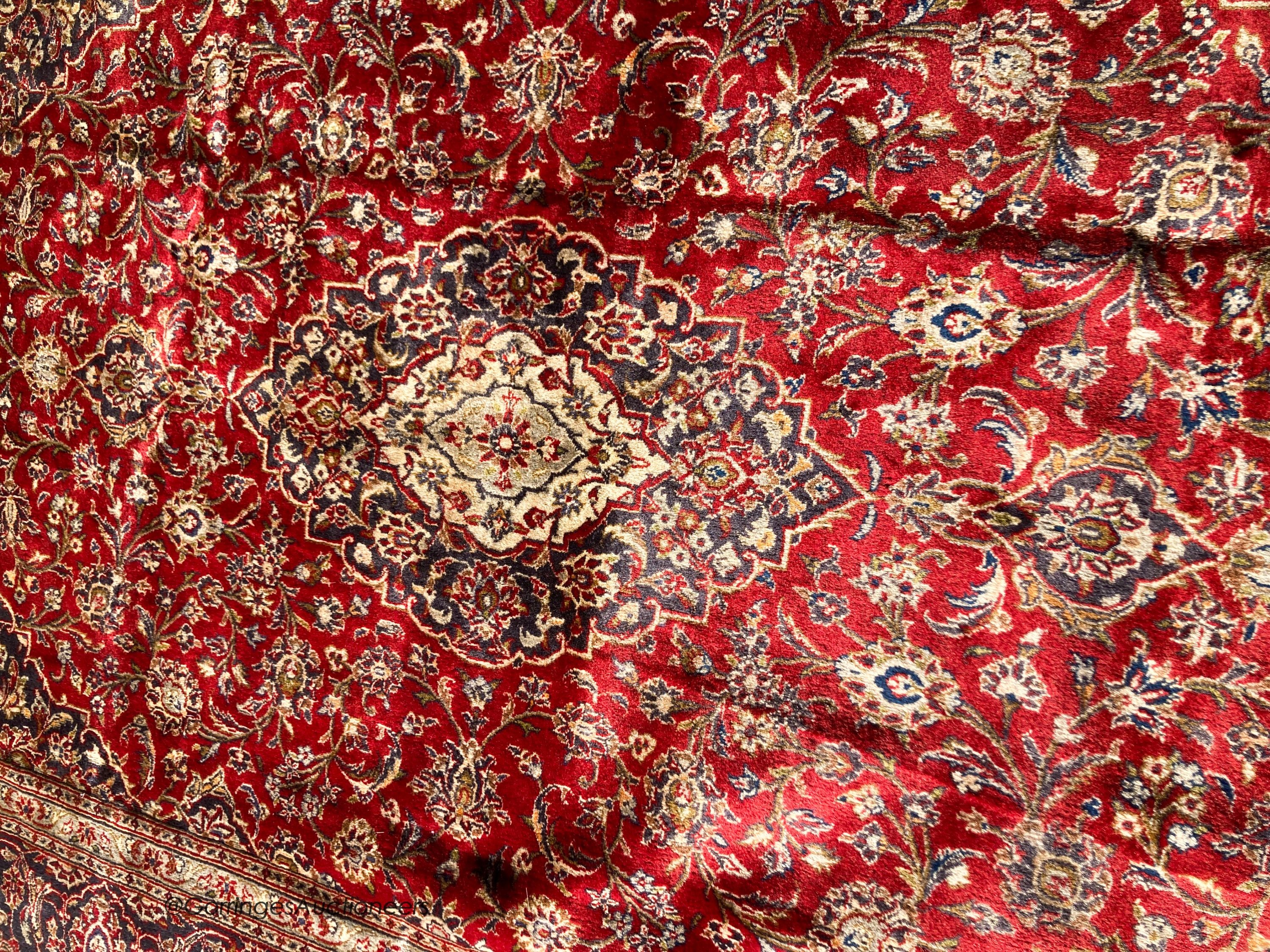 A Kashan carpet, 300 x 198cm